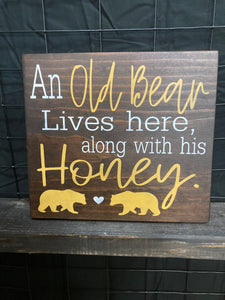 An old bear lives here along with his honey